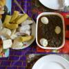 Typical fare - boiled plantains and yams with a stew. The stew usually has some type of fish in it. This one has a few eggs.