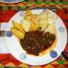 Stew, boiled plantains and yams.